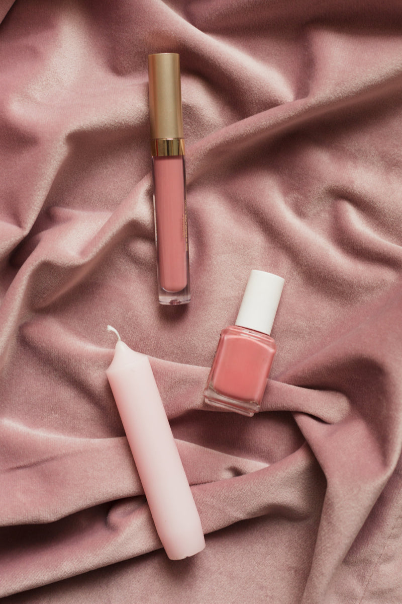 Blush makeup and candles